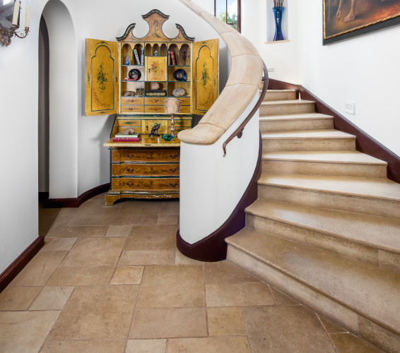 staircase with bookshelf